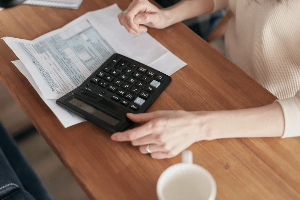 A woman using a calculator