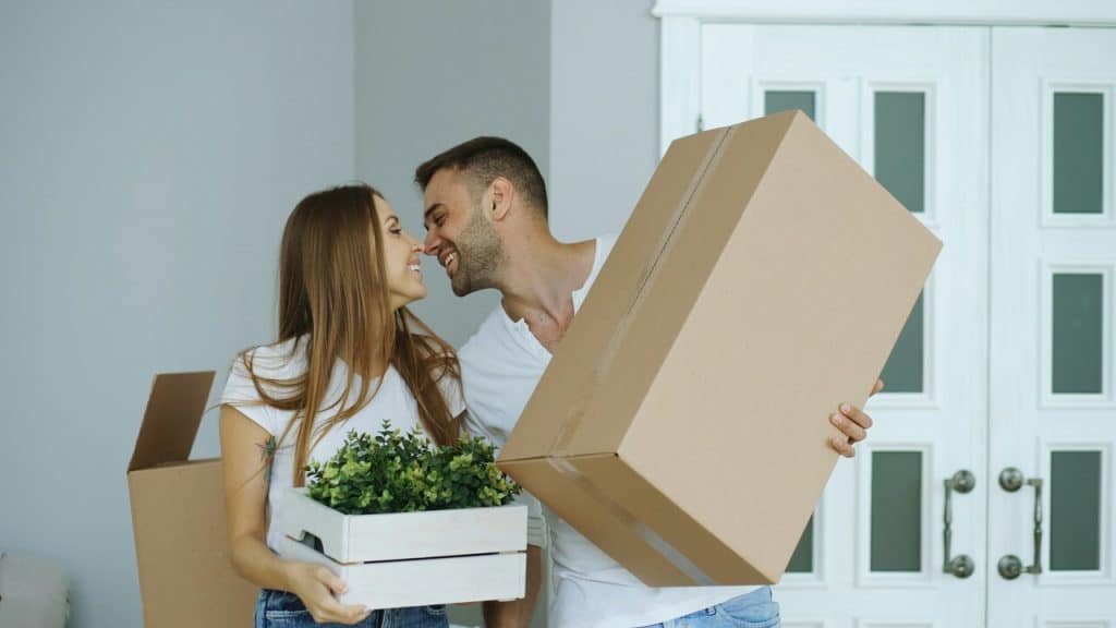 A couple about to kiss while moving