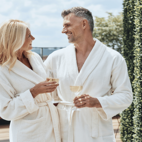 A beautiful mature couple wearing bathrobes