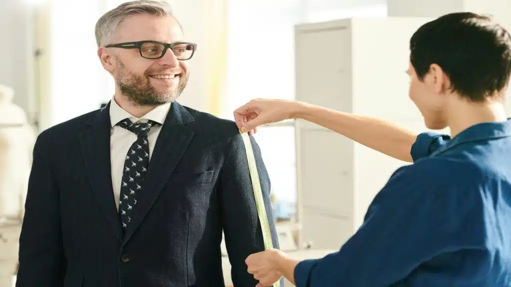 A man being fitted for a suit 
