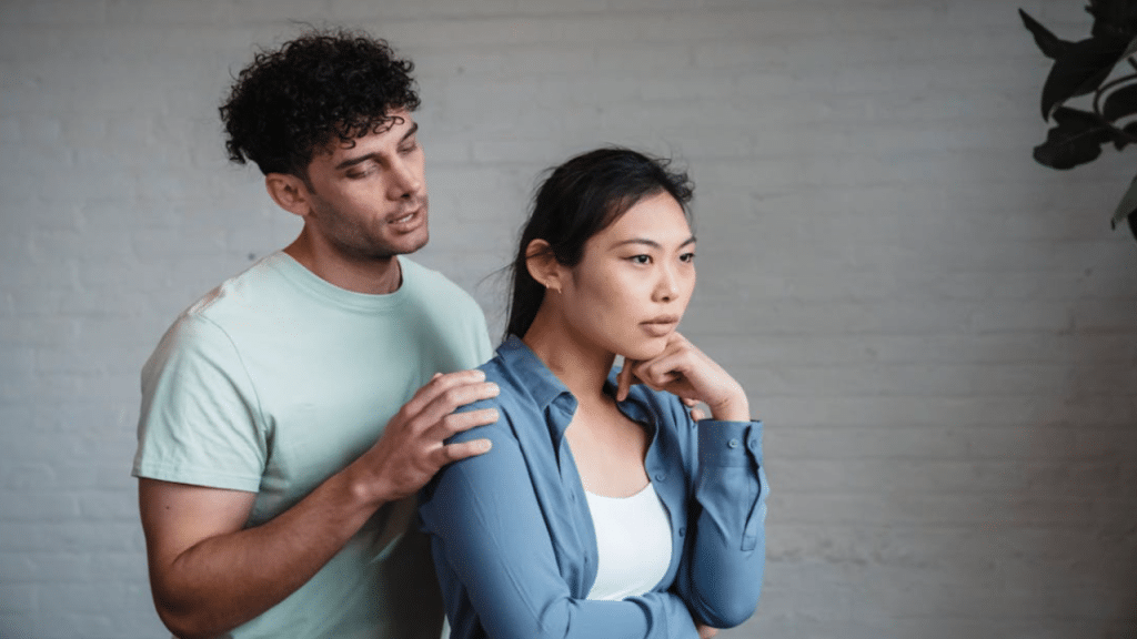 A man talking to his upset girlfriend