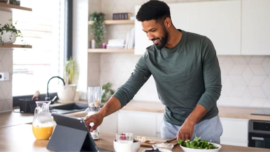 Man preparing a balanced meal in the kitchen
