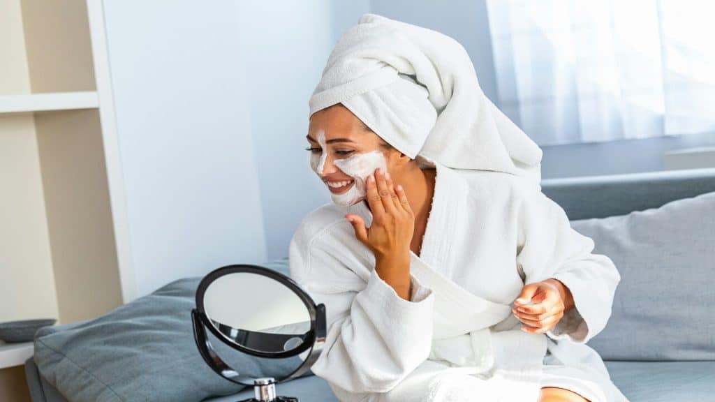 A woman doing her skincare