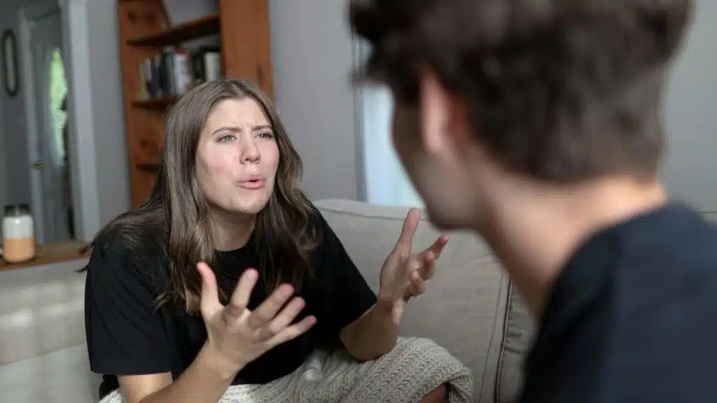 A woman complaining to her partner. 