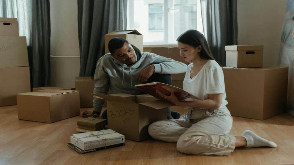 A couple looking at their photo albums 