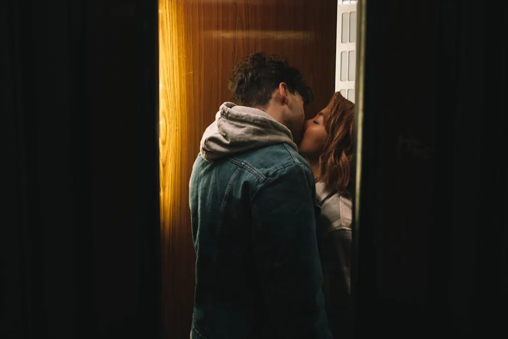 Beautiful Couple Kissing on the Doorway