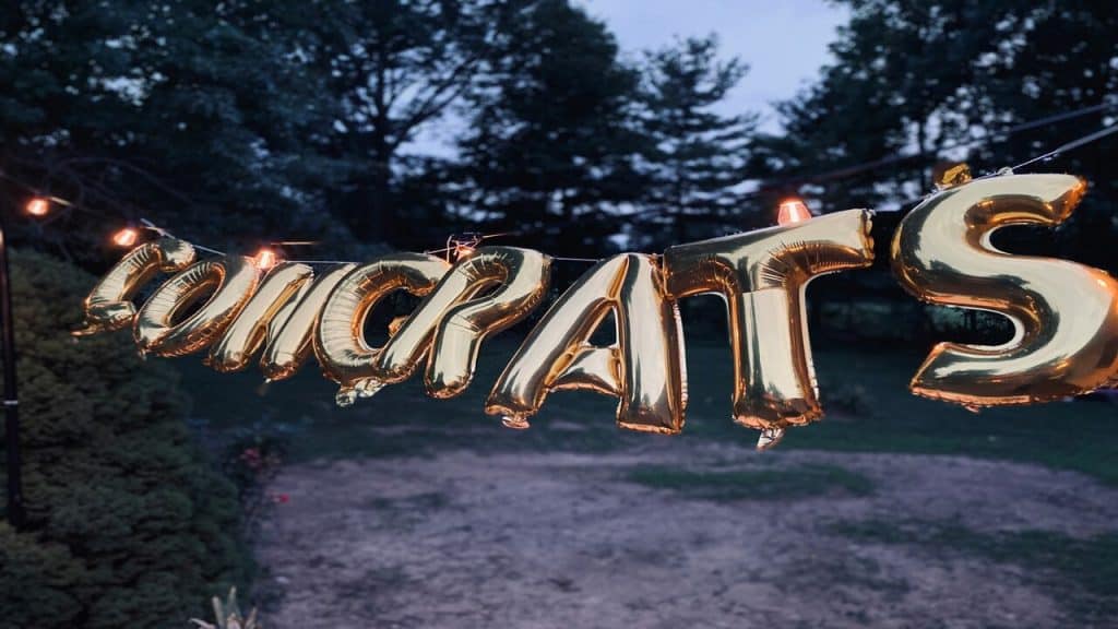 Balloons spelling out “congrats”