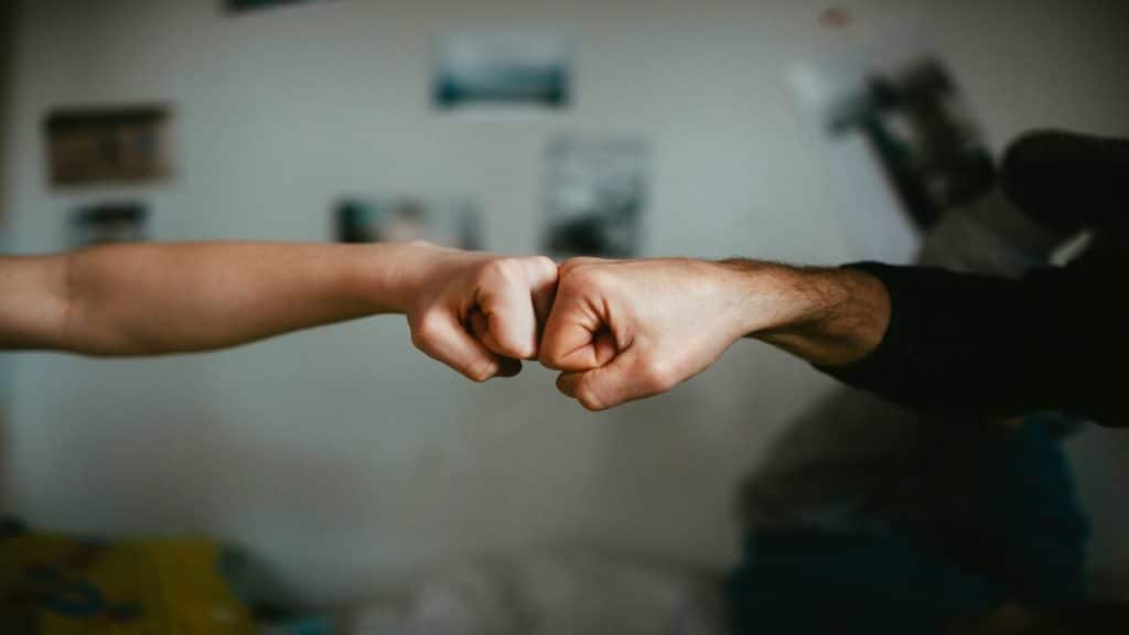 A couple doing the fist bump