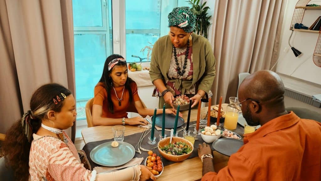 A group of people sitting around a table