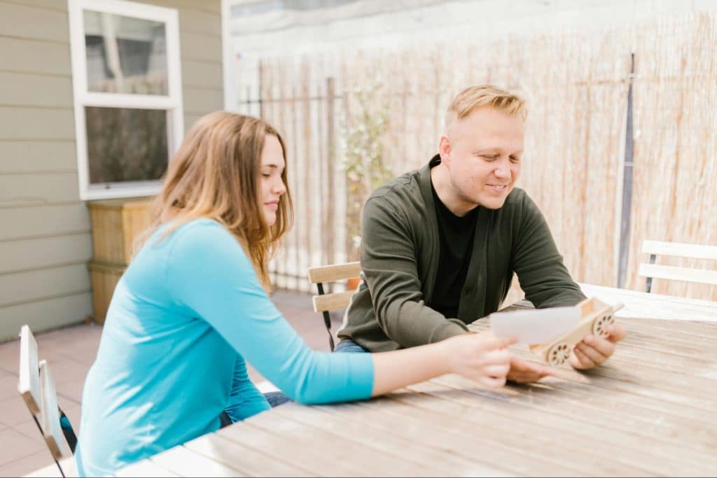A man and woman sitting