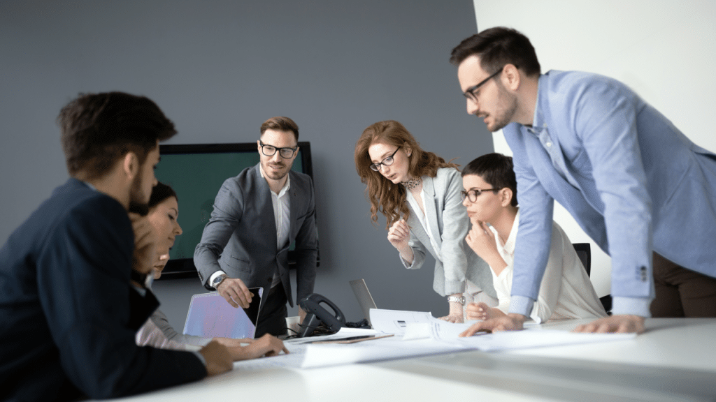A man leading a business meeting