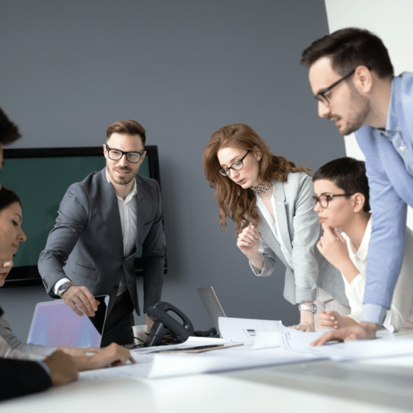 A man leading a business meeting