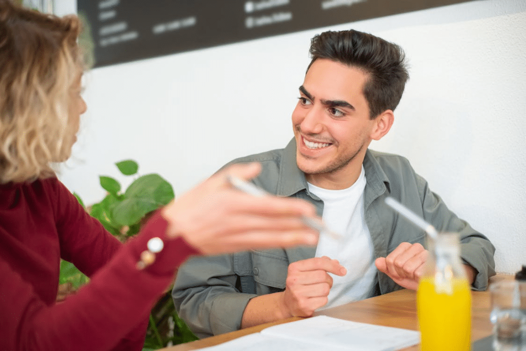 A Woman Talking to a Man