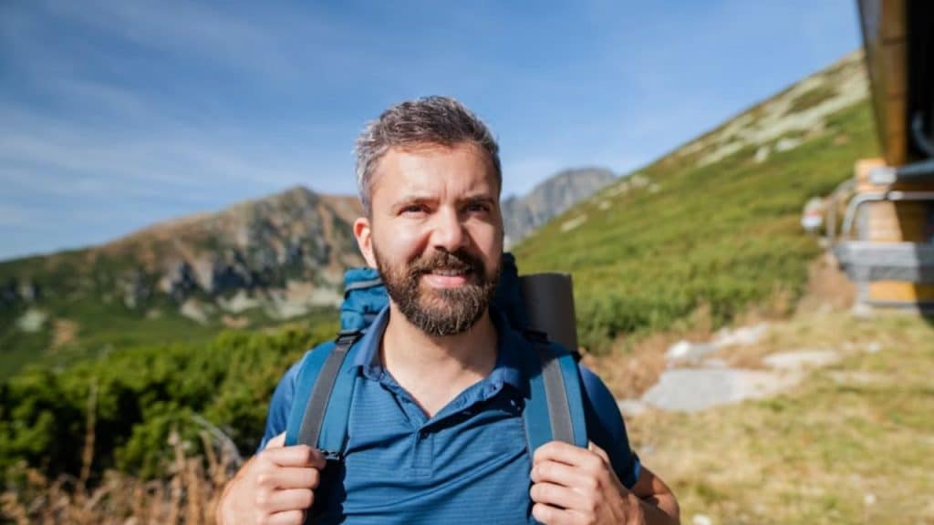 Man hiking alone on a scenic trail