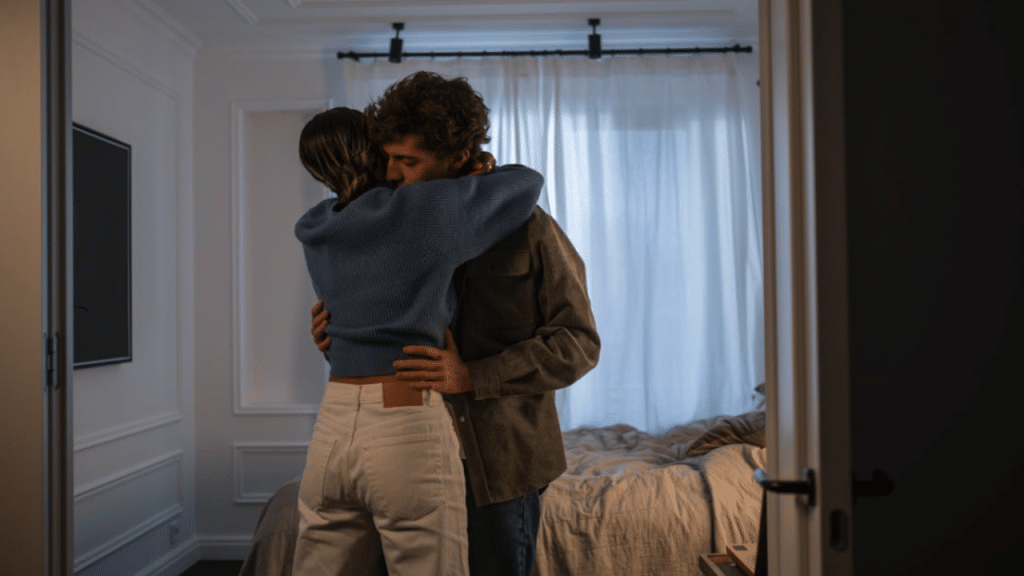 A man comforting his sad wife