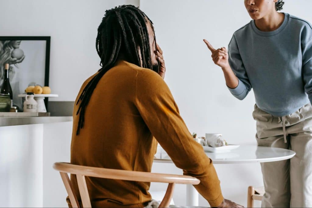 A man and woman looking stressed