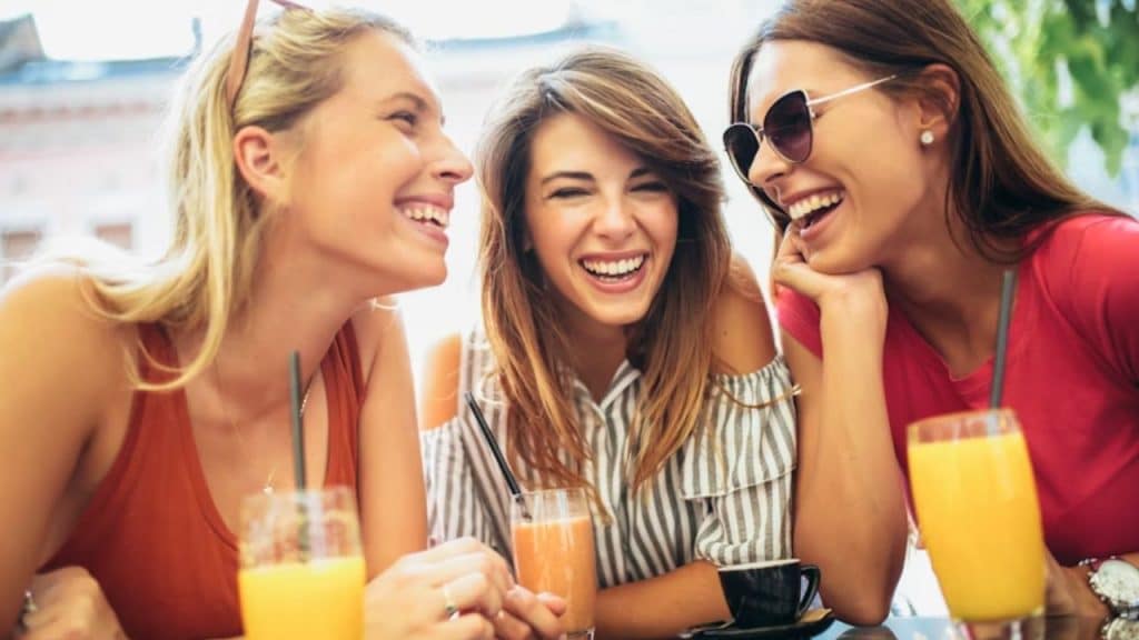 Woman smiling while spending time with friends