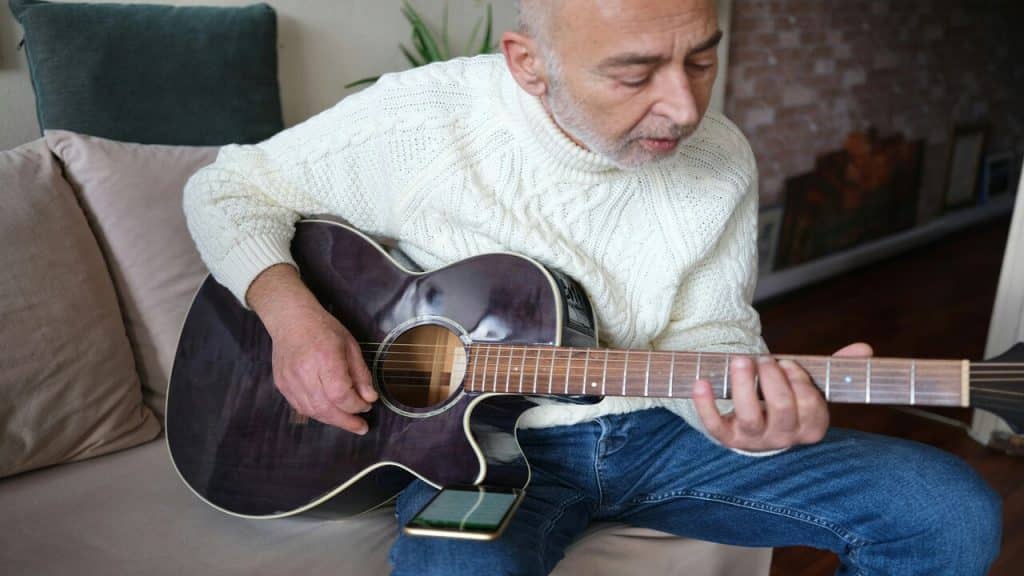 A man playing guitar