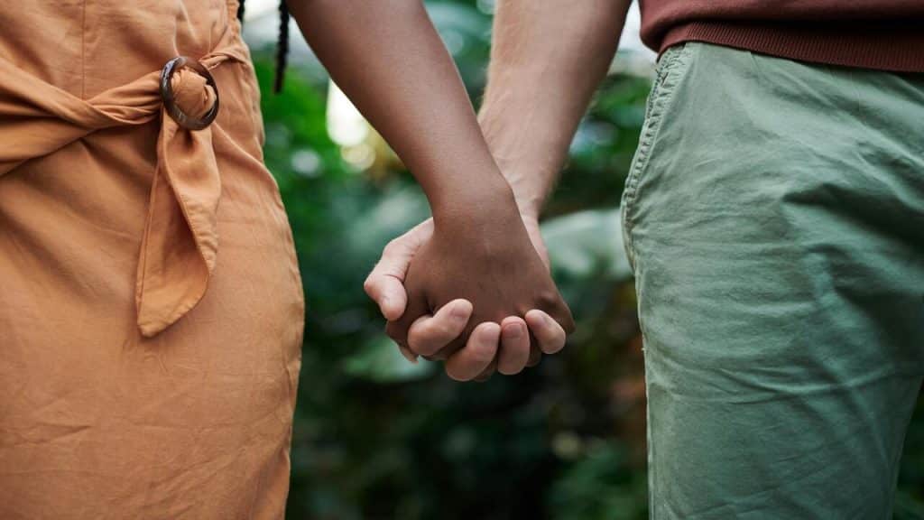 A couple holding hands