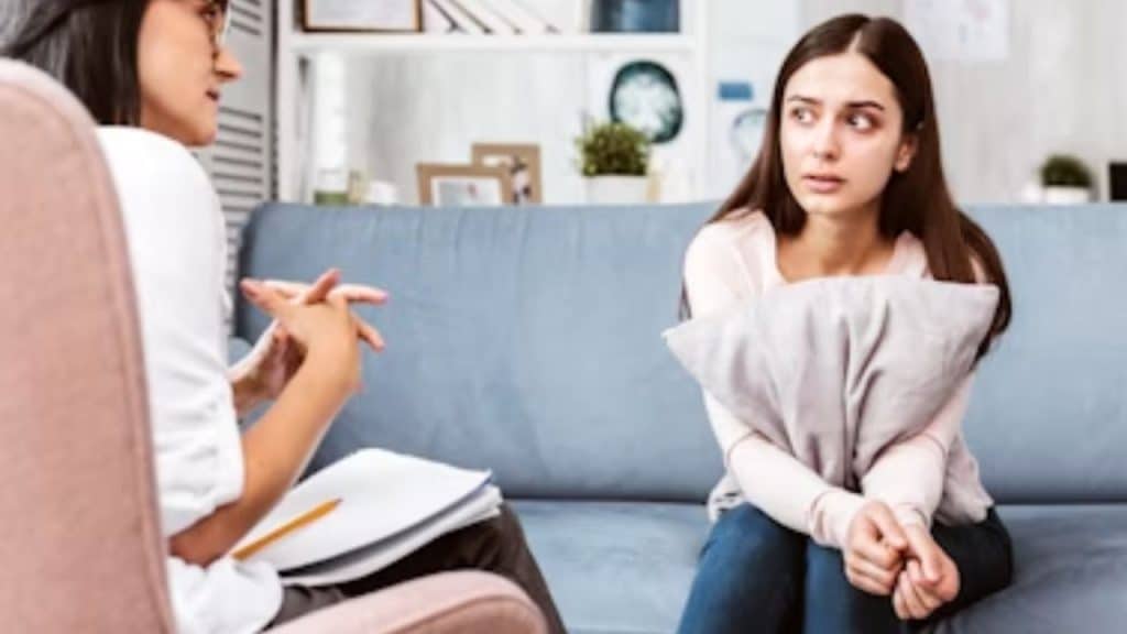 Woman sitting in therapy discussing her relationship