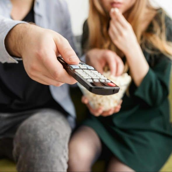 A couple watching a movie