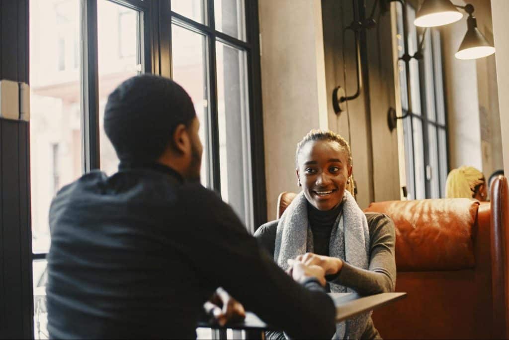 A man and woman talking