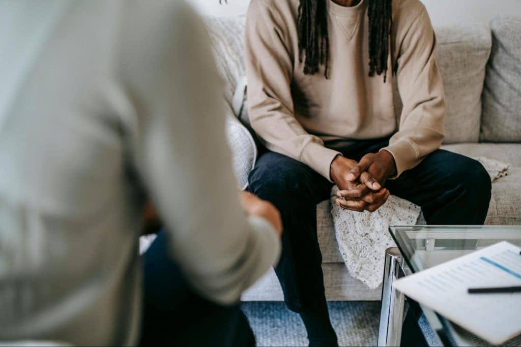 A man and woman talking