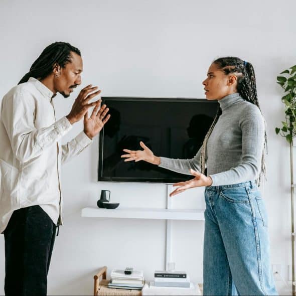 A man and woman arguing