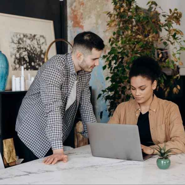 A man looking at the working woman