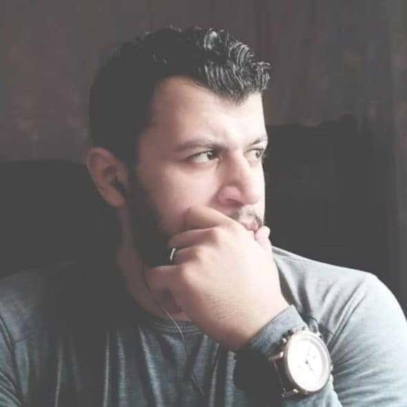 Husband looking thoughtful while sitting quietly at home