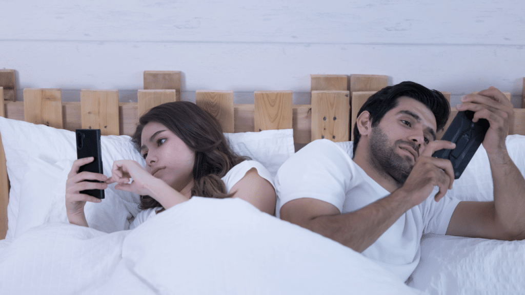A couple ignoring each other at home