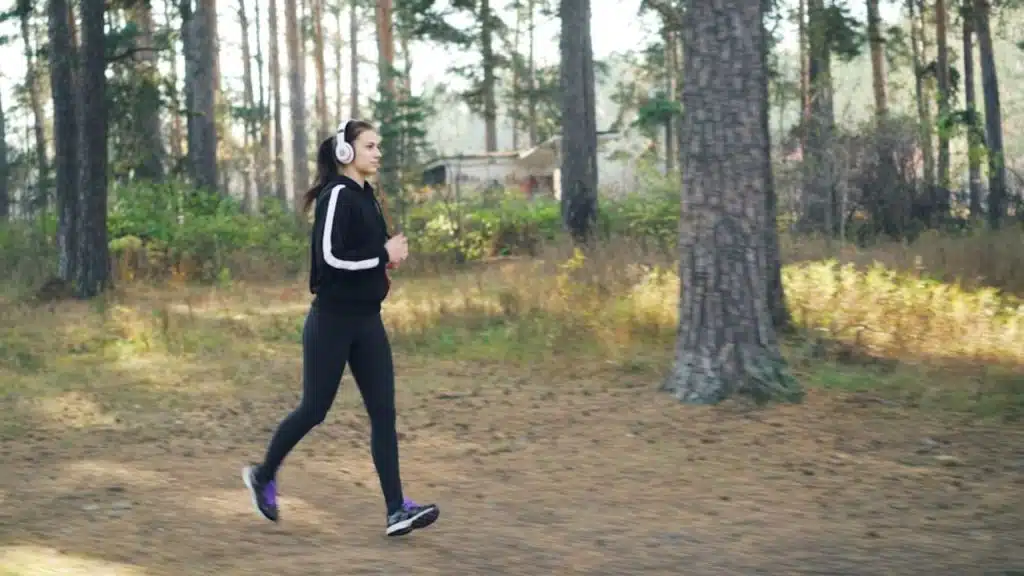 Woman jogging outdoors in the early morning