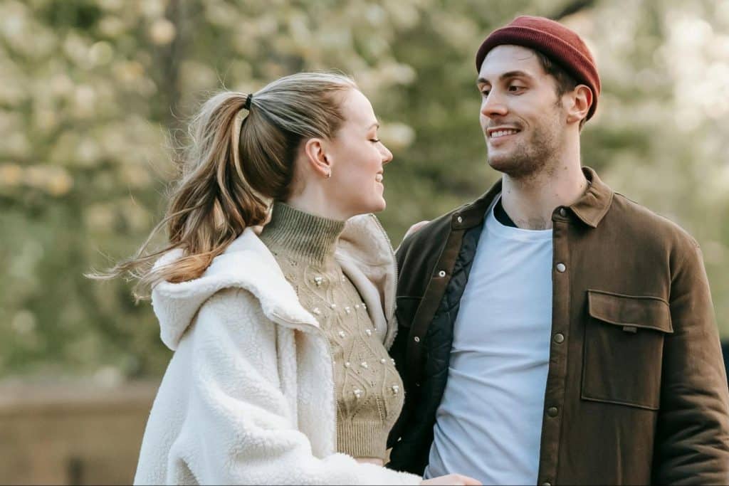 A man looking at the woman