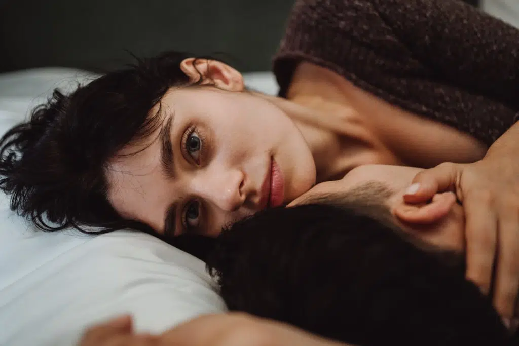 Couple Lying Down on Bed