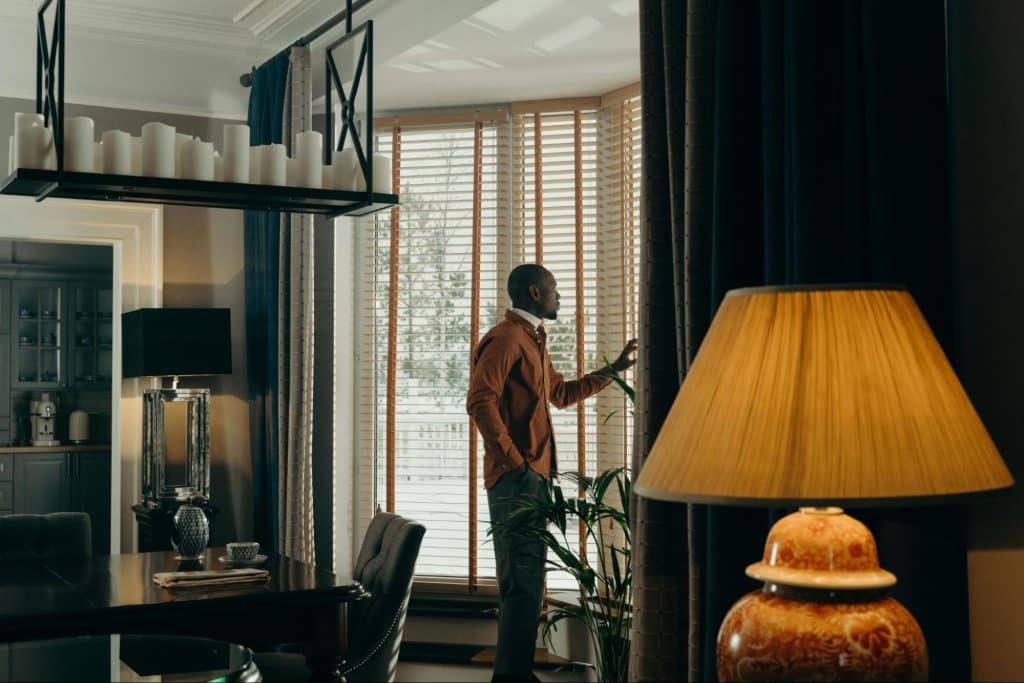 A man alone while looking outside