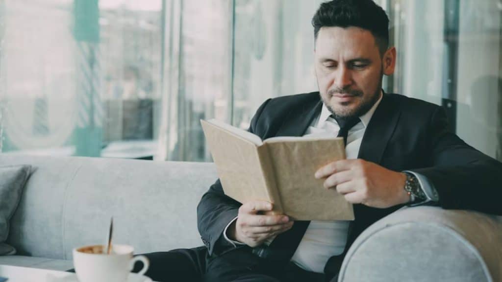 Man reading book on personal growth