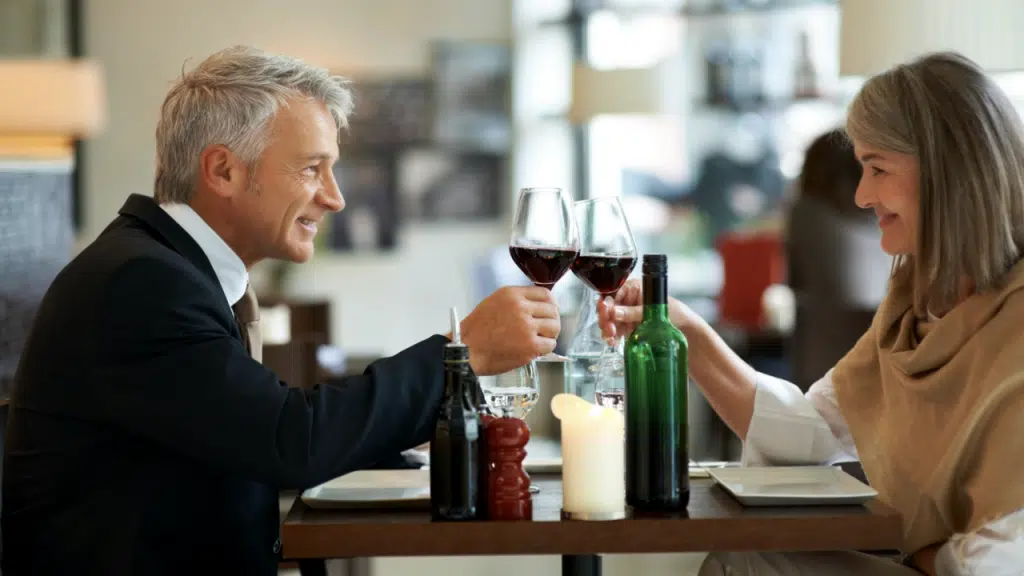 A couple having wine together