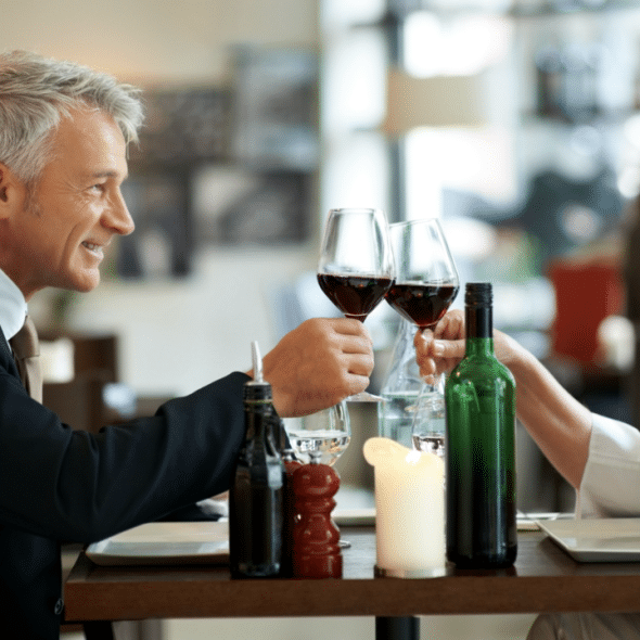 A couple having wine together