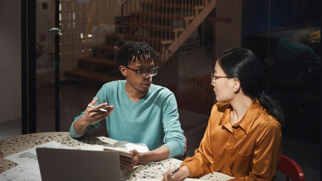 A man trying to explain something to a woman.
