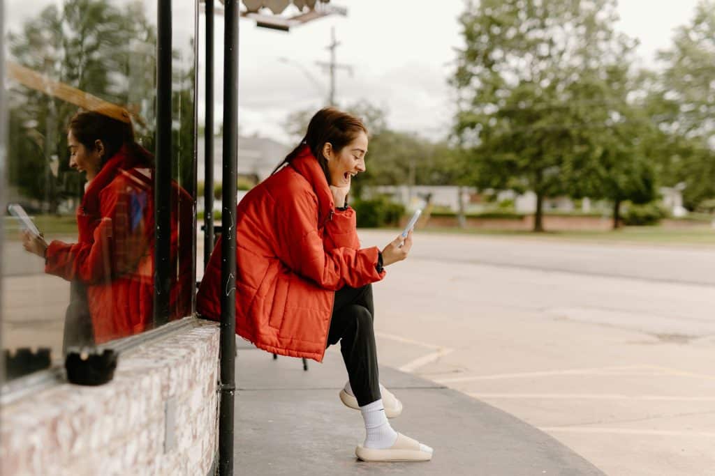 The woman is on a video call with someone.
