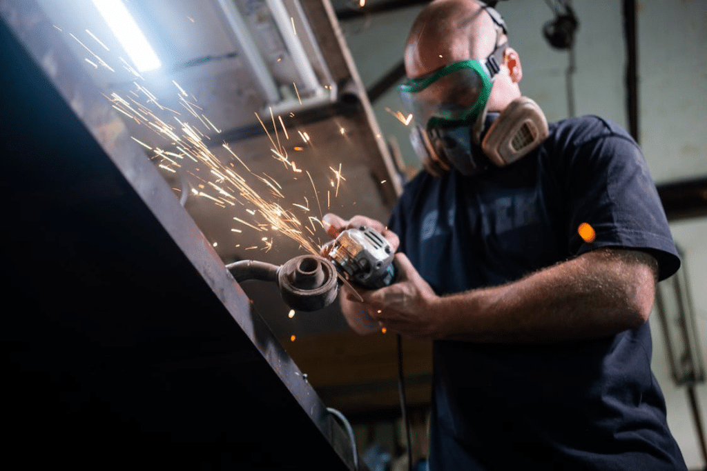 A Man Using a Grinder