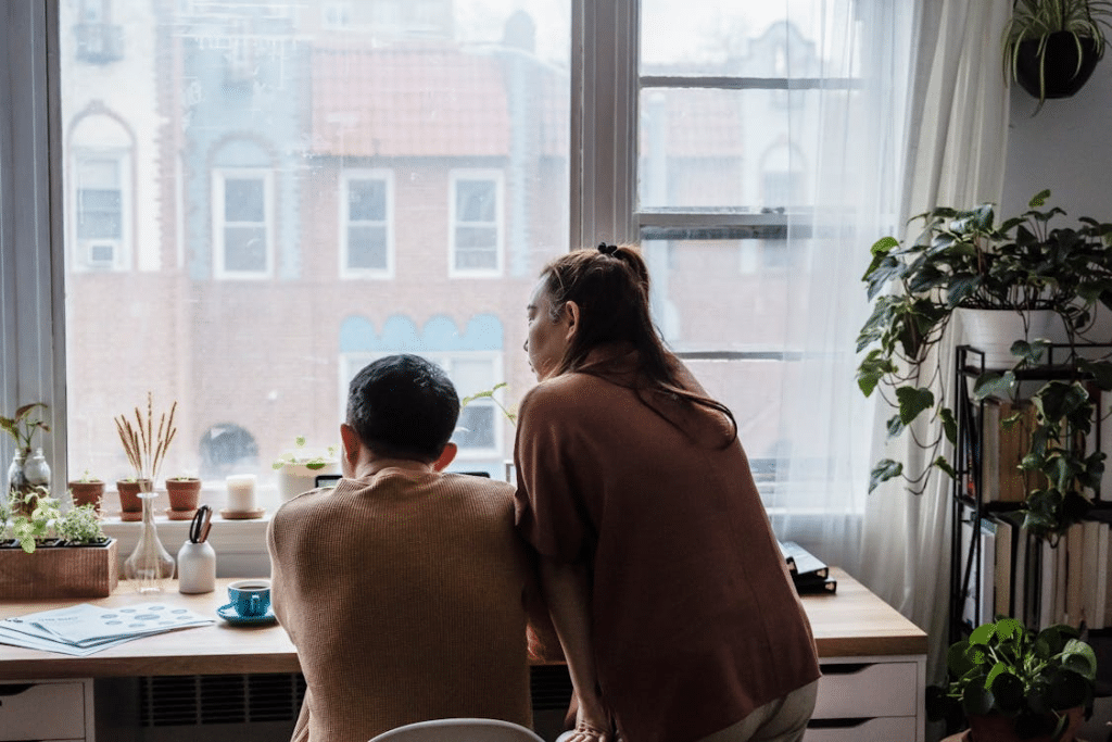 A Couple Sitting at the Table