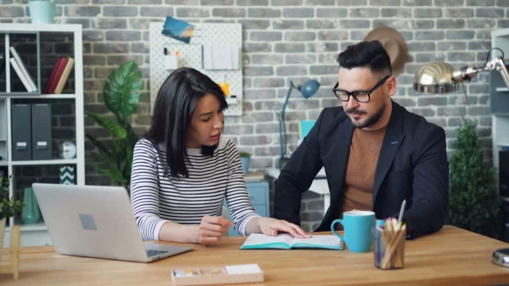 A woman looking unimpressed with her partner's hobby