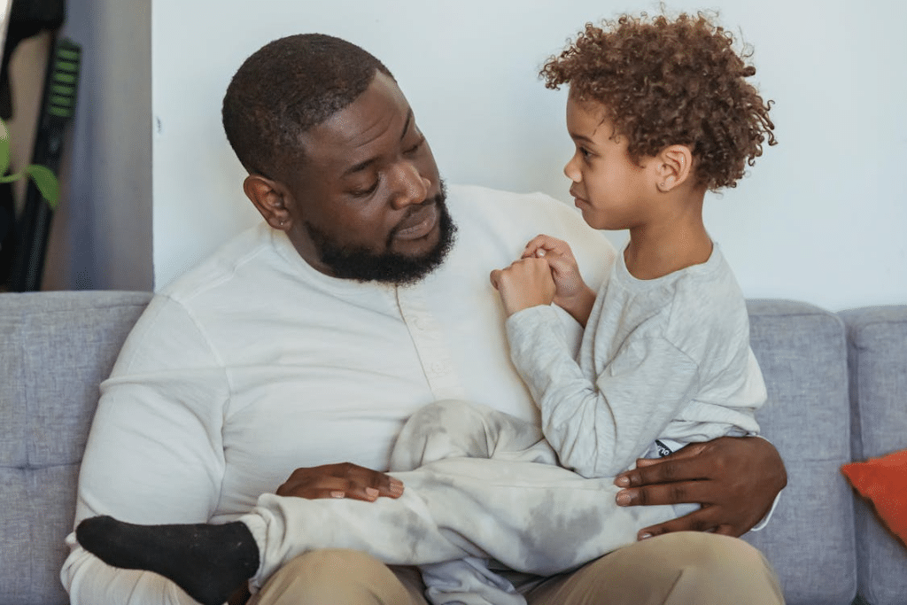 Father with son on knees
