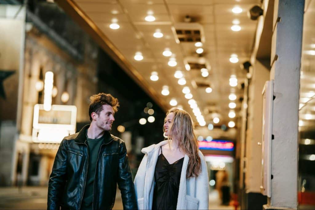 A man and woman walking 