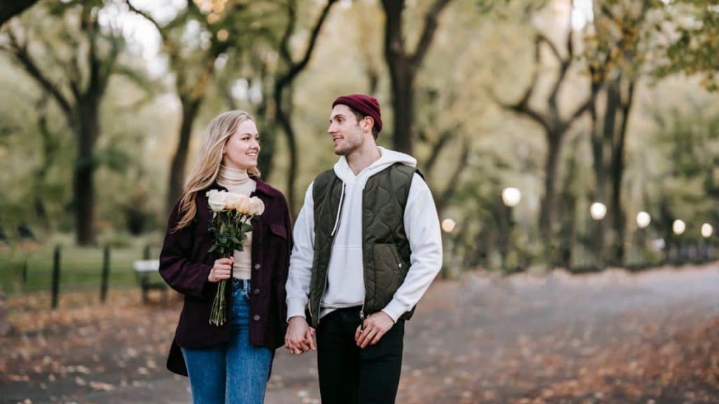 Couple maintaining closeness through affectionate touch.