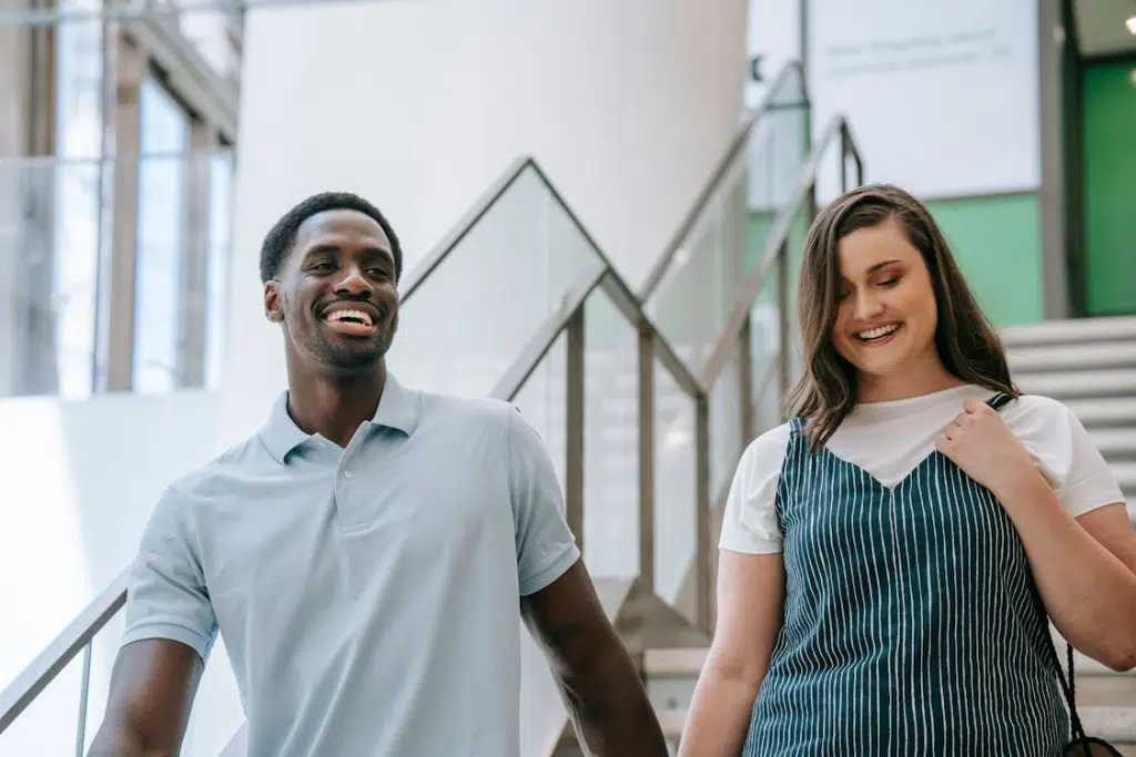 Man and woman Walking Down the Stairs