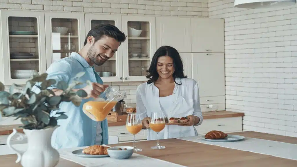 A couple preparing breakfast together