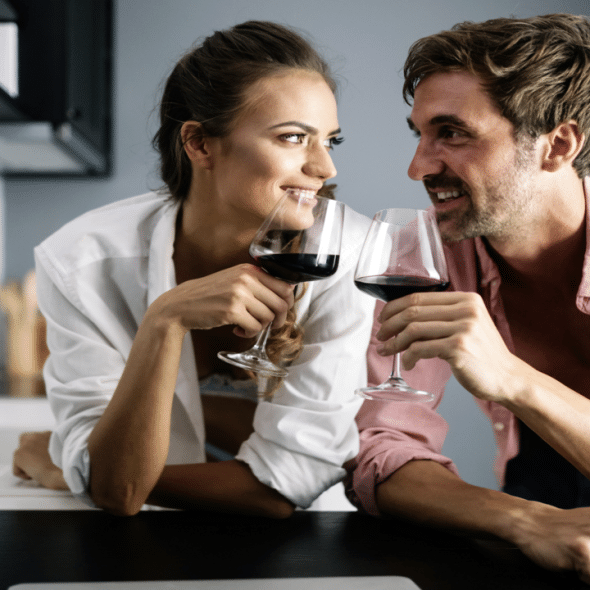 A couple having wine together