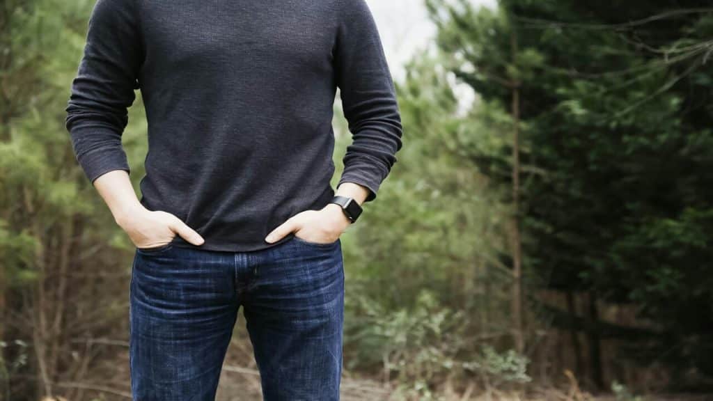 A man in a shirt and jeans